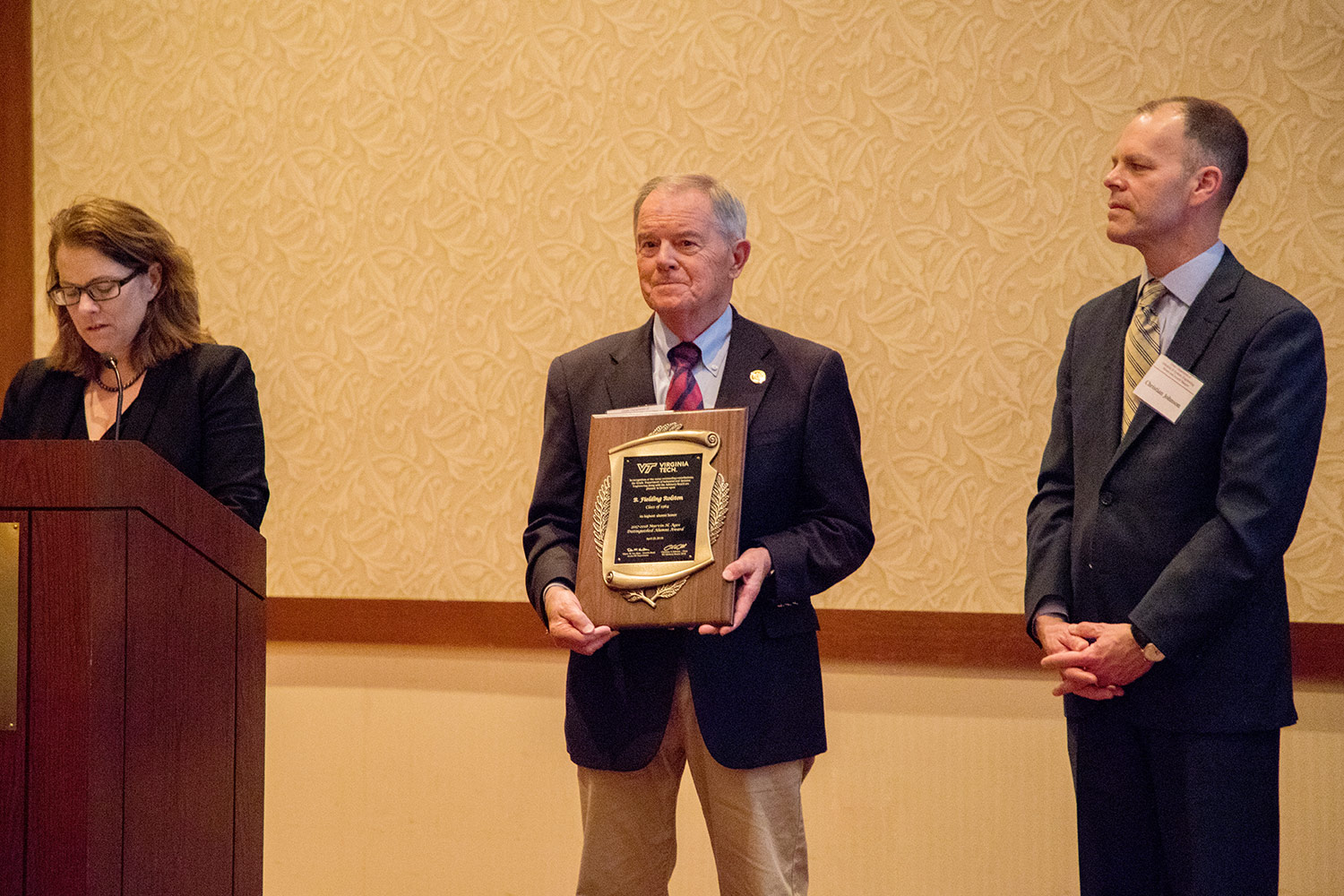 Marvin H. Agee Distinguished Alumni Award recipient Mr. B. Fielding Rolston (center), Interim Department Head Dr. Eileen Van Aken (left), ISE Advisory Board chair Christian Johnson.