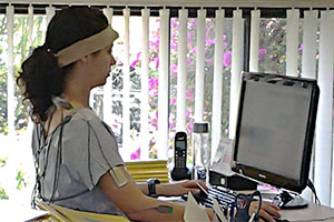 sit-stand table: Adjustable sit-stand desk being used in a standing position sit-stand table: Adjustable sit-stand desk being used in a standing position