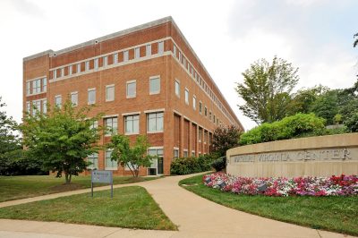 Exterior photo of the brick Northern Virginia Center in Falls Church