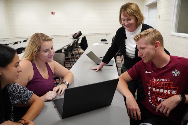 Dr. Kimberly Ellis instructs students on how to get started playing "The Game"