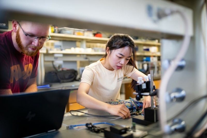 Students work in Blake Johnson's (associate professor in industrial systems and engineering) lab researching the effects of wound healing in microgravity.